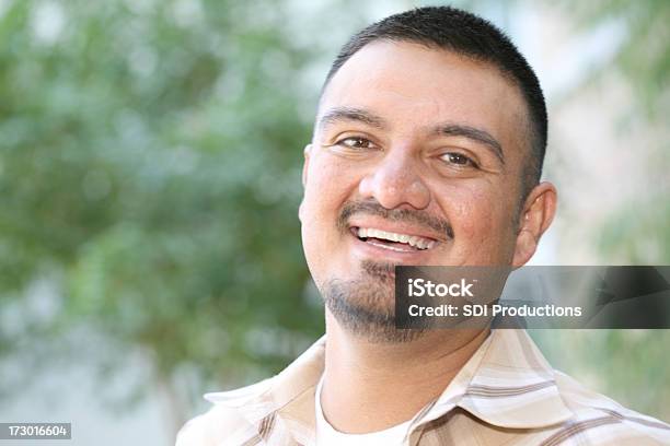 Handsome Hispanic Male Having A Laugh Stock Photo - Download Image Now - Adult, Adults Only, Beautiful People