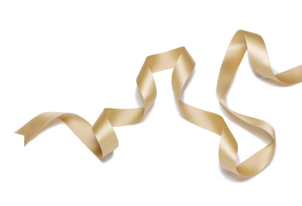 Gold ribbon Gold curled ribbon ribbon sewing item stock pictures, royalty-free photos & images