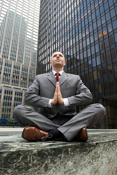 istock Businessman Seeking Peace in the Plaza 173017163