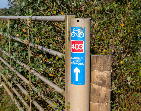 Cycle route sign on gate post