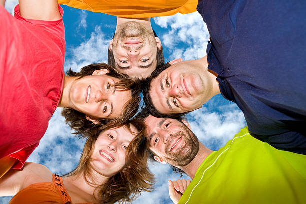 istock colorful friend hug in sunny day with clear sky 173017380