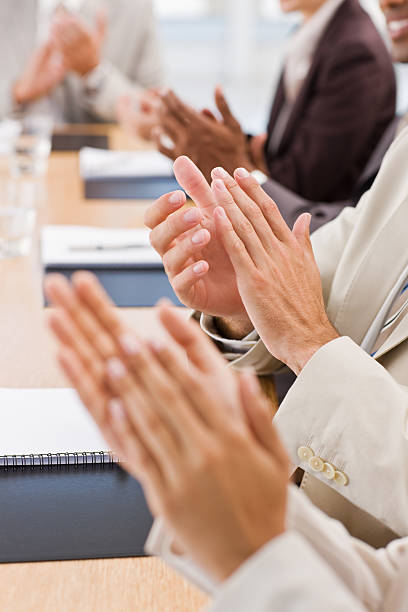 istock Closeup of businesspeople clapping 173017569