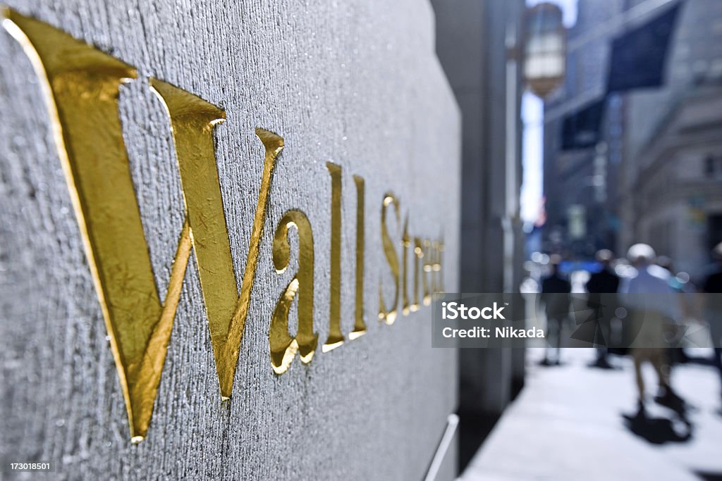 Wallstreet, New York golden Wall Street sign in the downtown financial district of New York, USA New York Stock Exchange Stock Photo