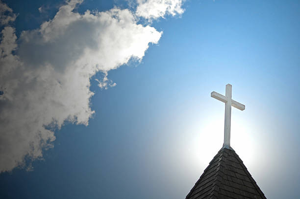 istock Church Steeple Backlighted by the Sun 173020340