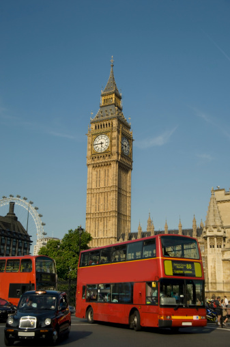 London, United Kingdom - May 22 2022: Westminster tube station with the Elisabeth tower and Big Ben in the background