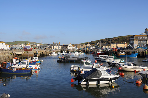 Boats moored in West Bay harbour