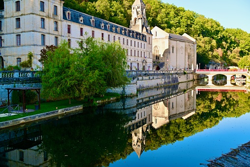 The only city in the Dordogne  surround on all sides by a ricer. The Drone River its in front of the Brantome abbey. Emperor Charlemagne founded the Benedictine monastery, abbey cloister gallery, and bell tower.