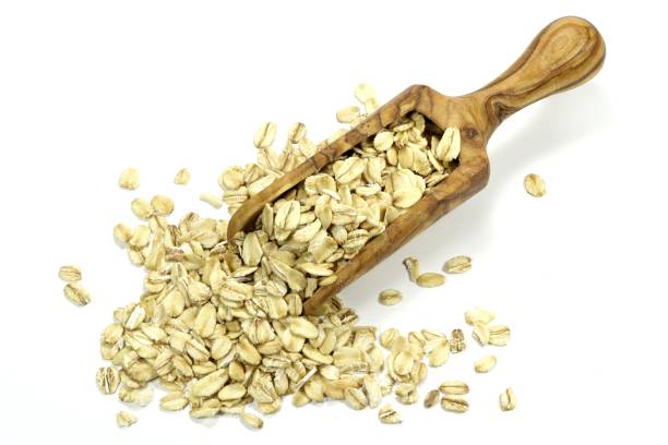istock wooden scoop with oatmeal 1730216189