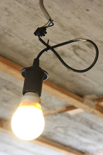 istock bulb holder for renovation with energy saving lamp 1730219383