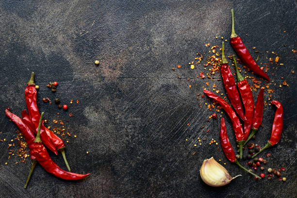 istock Chili pepper and garlic. Top view with copy space. 1730226304