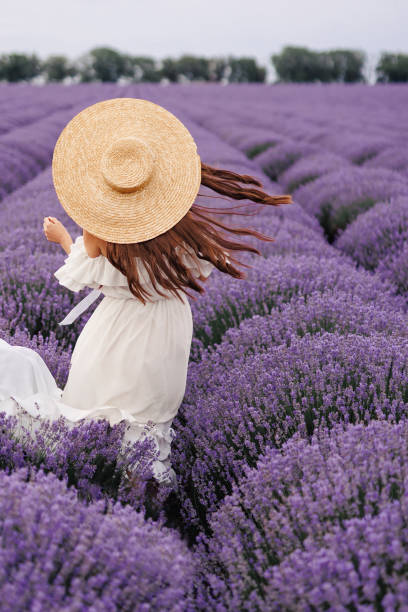 istock a girl in lavendar field 1730226306