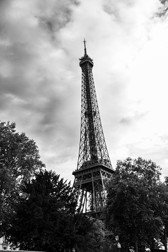 Black and white photo of Paris, France. Aerial view on the Eiffel Tower, Arc de Triomphe, Les Invalides etc.