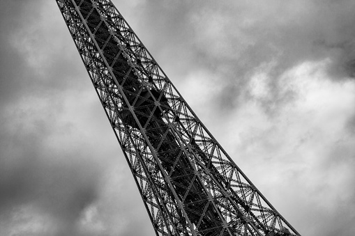 Eiffel Tower with a moody sky in black & white at dusk, Paris, France