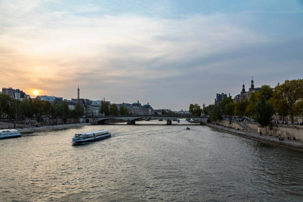 istock Sunset over the Seine River with the Eiffel Tower in the background 1730236288
