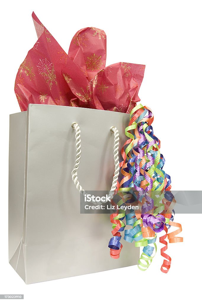 Silver Gift Bag With Tissue Paper And Streamers Stock Photo - Download  Image Now - Bag, Birthday, Birthday Present - iStock