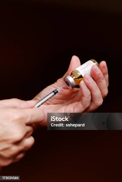 Filling Syringe Against Dark Background Stock Photo - Download Image Now - Cancer Drug, Adult, Antibiotic