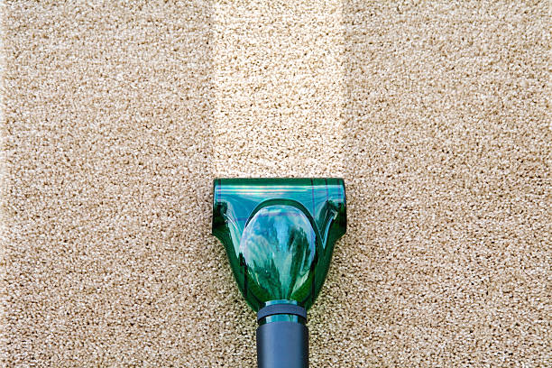 Carpet and vacuum stock photo