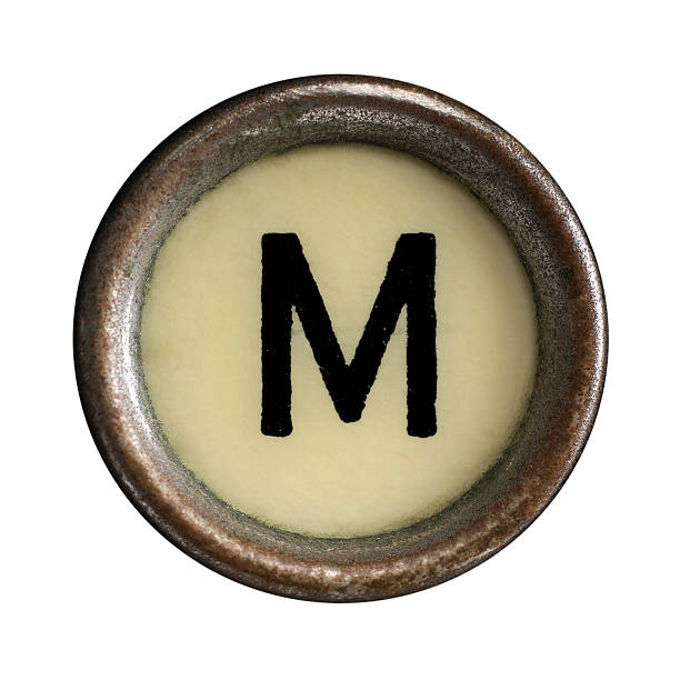 появление ключи - letter m typewriter key typewriter alphabet стоковые фото и изображения