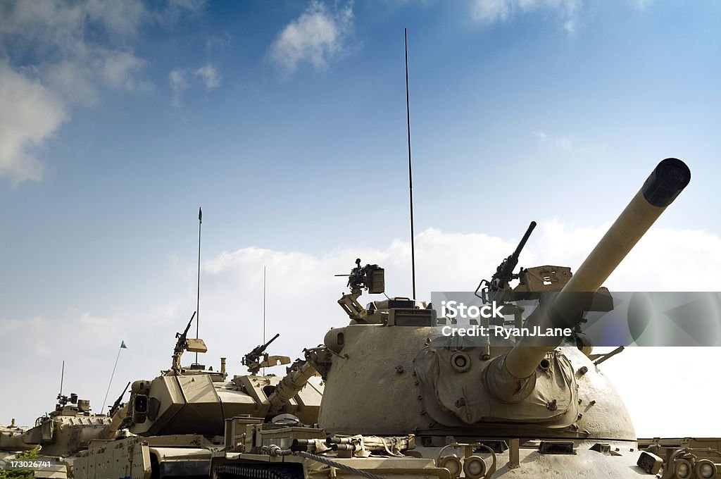 Tank Convoy with Copy Space A line of tanks headed to battle, with a blue sky overhead available for copy space. Armored Tank Stock Photo