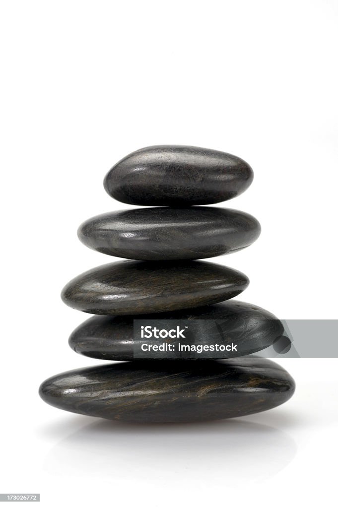 Stack of black spa volcanic stones  Alternative Therapy Stock Photo