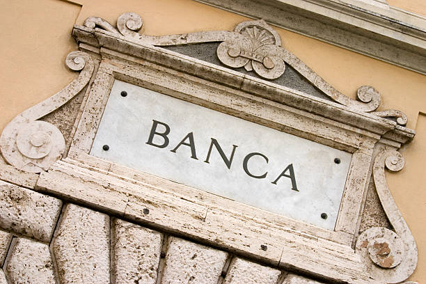 The signage of an Italian Bank etched in marble  stock photo
