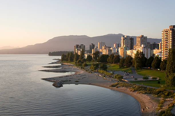 A beautiful view of west Vancouver Canada Vancouver west end at sunset. beach english bay vancouver skyline stock pictures, royalty-free photos & images