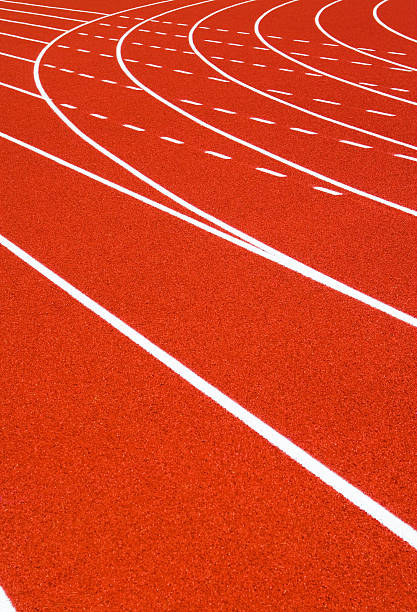 istock Corner view of running tracks with white lane lines 173027842