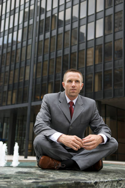 istock Businessman Sits and Thinks on Plaza 173029539