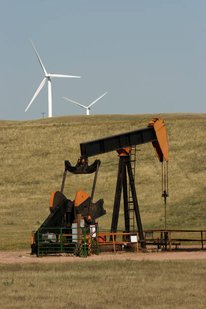 istock Oil pumps and wind turbines 173029645