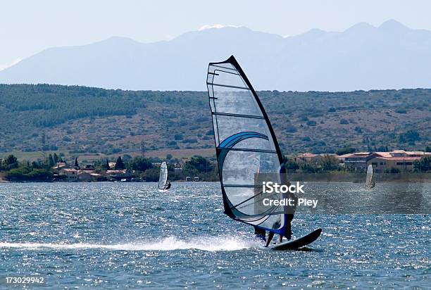 Windsurfers On A Pond In France Stock Photo - Download Image Now - Bay of Water, Clear Sky, Horizon Over Water