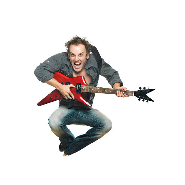 Man jumping with electric guitar