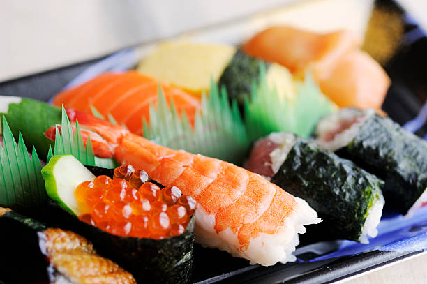 istock A plate displaying different types of sushi and sashimi 173030573