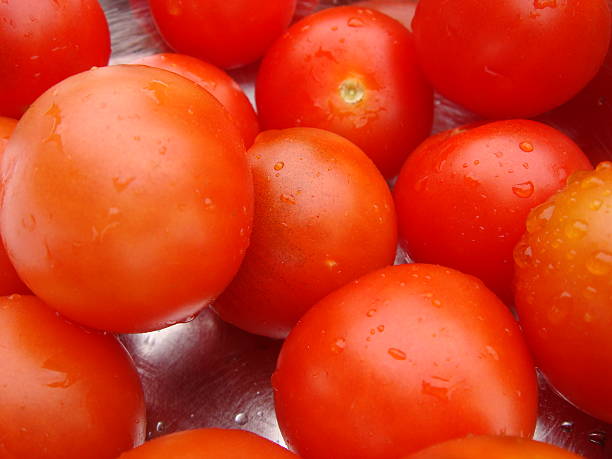 cherry tomatoes - fsachs78 stockfoto's en -beelden