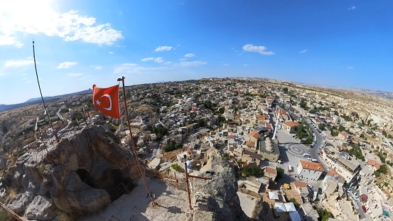 Ortahisar Castle, situated in the heart of Cappadocia, Turkey, is a captivating historical monument that has stood the test of time. Perched atop a towering rock formation.