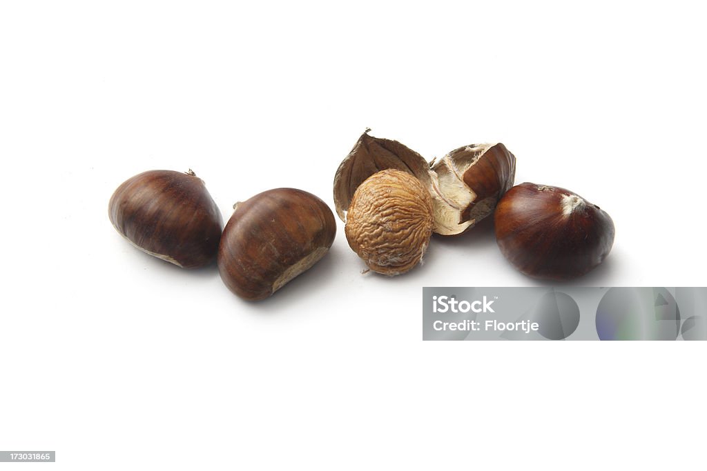 Nuts: Chestnuts Chestnuts isolated on white Brown Stock Photo