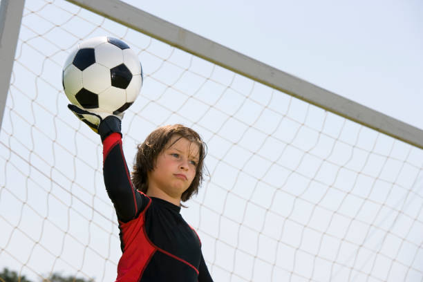 istock young goalie with ball 173032181