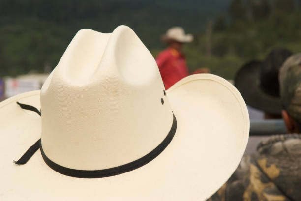istock Rodeo Scene with Cowboys and White Cowboy Hat 173032249