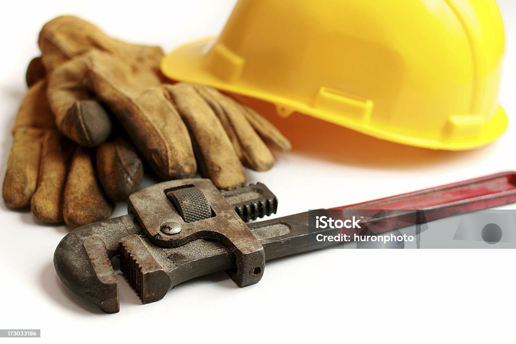 Llave ajustable para tuberías - Foto de stock de Guantes de trabajo libre de derechos