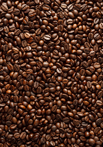 A high resolution coffee bean texture made with a tilt and shift (TSE90mm) lens. This photo is extremely sharp and has lots of detail.