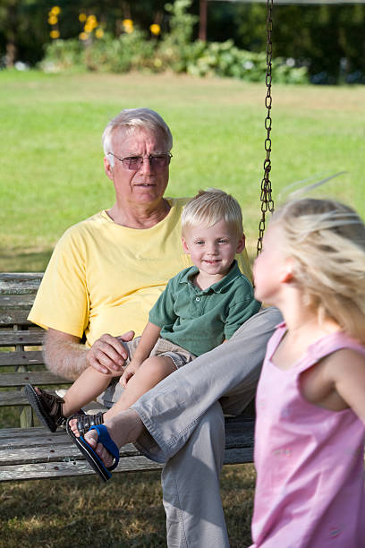 istock grandpa watches grandchildren 173033708