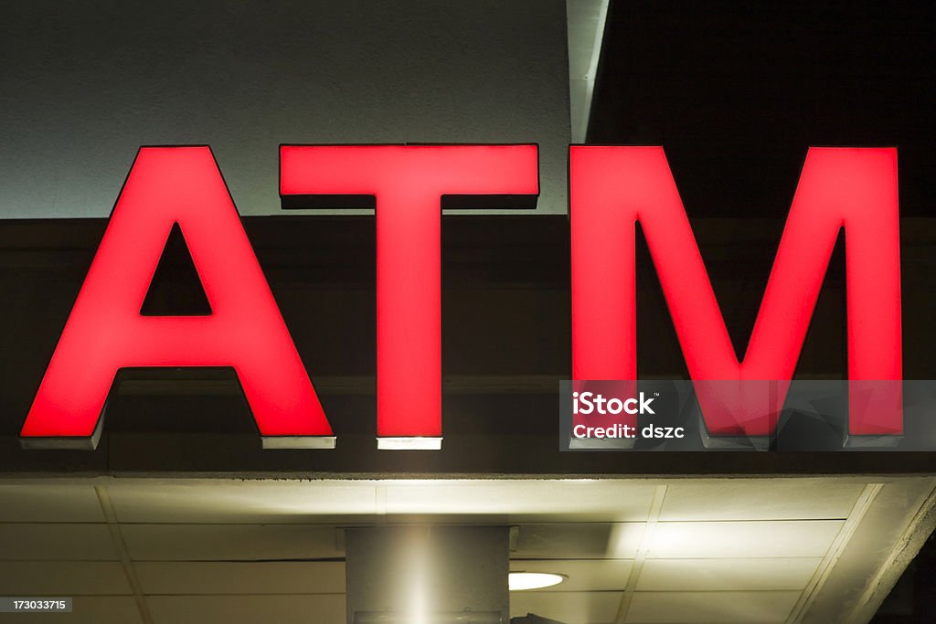 red ATM Geldautomat-beleuchtet bei Nacht - Lizenzfrei Aufnahme von unten Stock-Foto