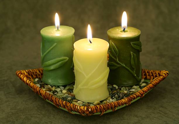 Bamboo Candle Trio in basket stock photo