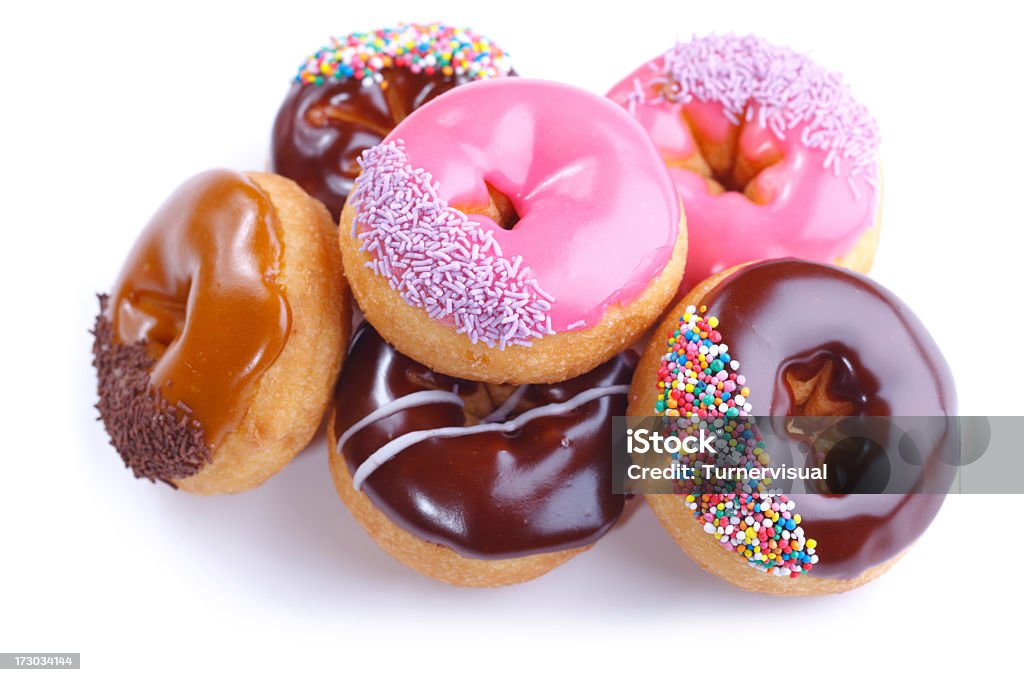 Six Donuts Isolated on White 6 donuts isolated on a plain white background. Doughnut Stock Photo