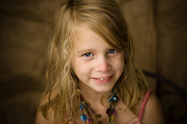 istock young girl smiles 173034822
