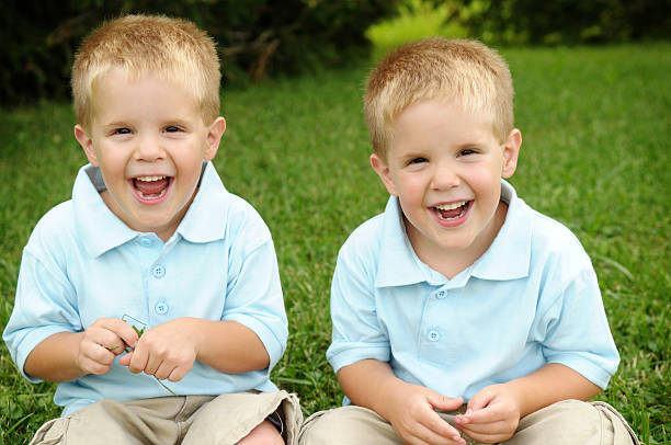 istock Twin Boys Laughing Together Outside 173035098