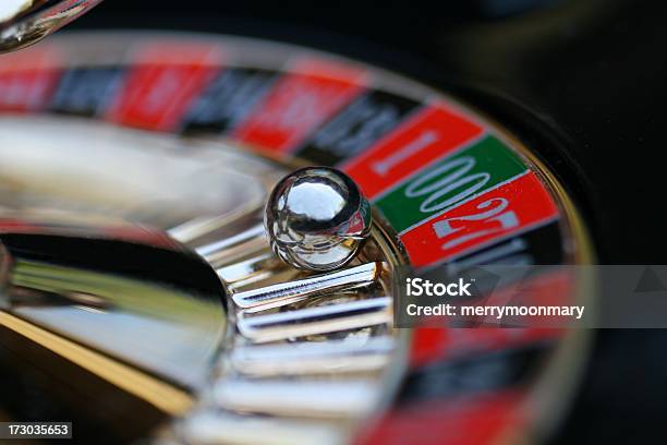 A Roulette Wheel With The Ball On 00 Stock Photo - Download Image Now - Roulette, Roulette Wheel, Spinning
