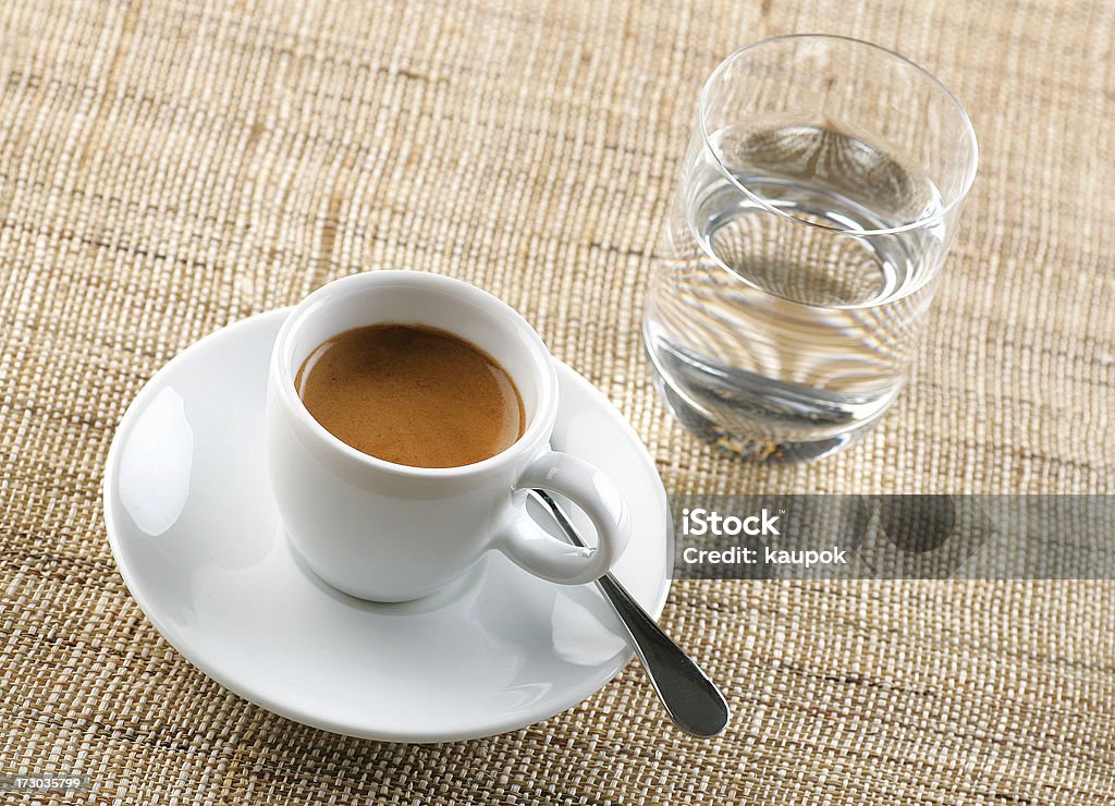 espresso with water cup of espresso and glass of water on linen background Arts Culture and Entertainment Stock Photo