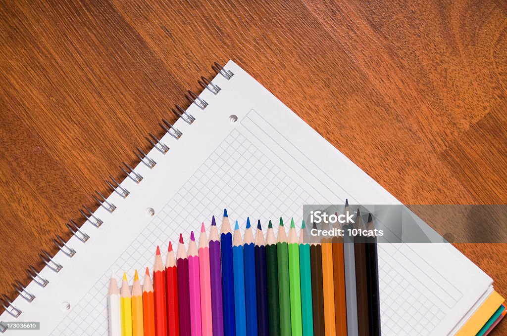 colored pencil empty notebook on the floor Annotation Stock Photo