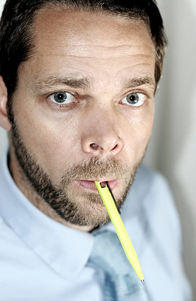 istock business man and pen 173036879