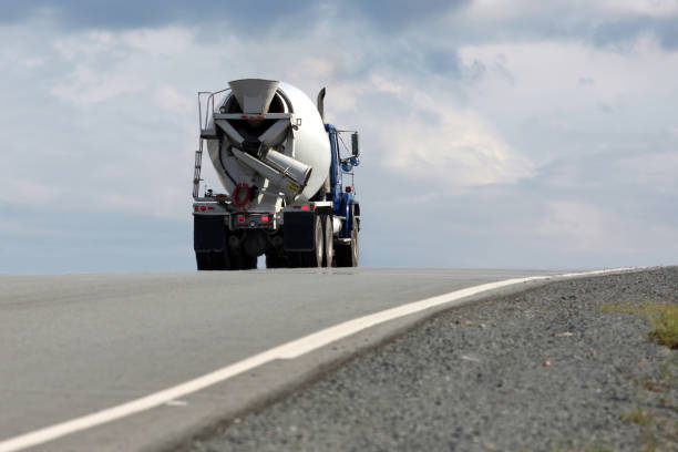 Heavy cement mixer truck on the road.
